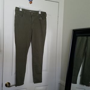Olive green mid rise rockstar skinny jeans